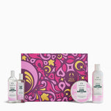Set of Cherry Blossom-themed products including bottles and a box on a white background