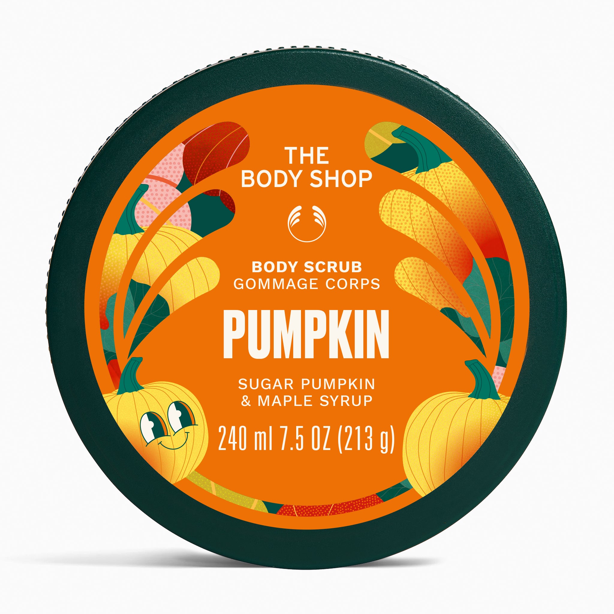 The Body Shop Pumpkin Body Scrub in a round dark green tub with a bright orange label featuring pumpkins and autumn leaves.