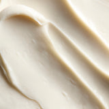 Close-up of smooth Shea body butter cream, showing soft swirls and a rich, creamy texture | The Body Shop