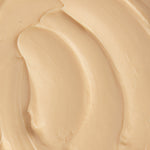 A close-up texture shot of Gingerbread hand balm.