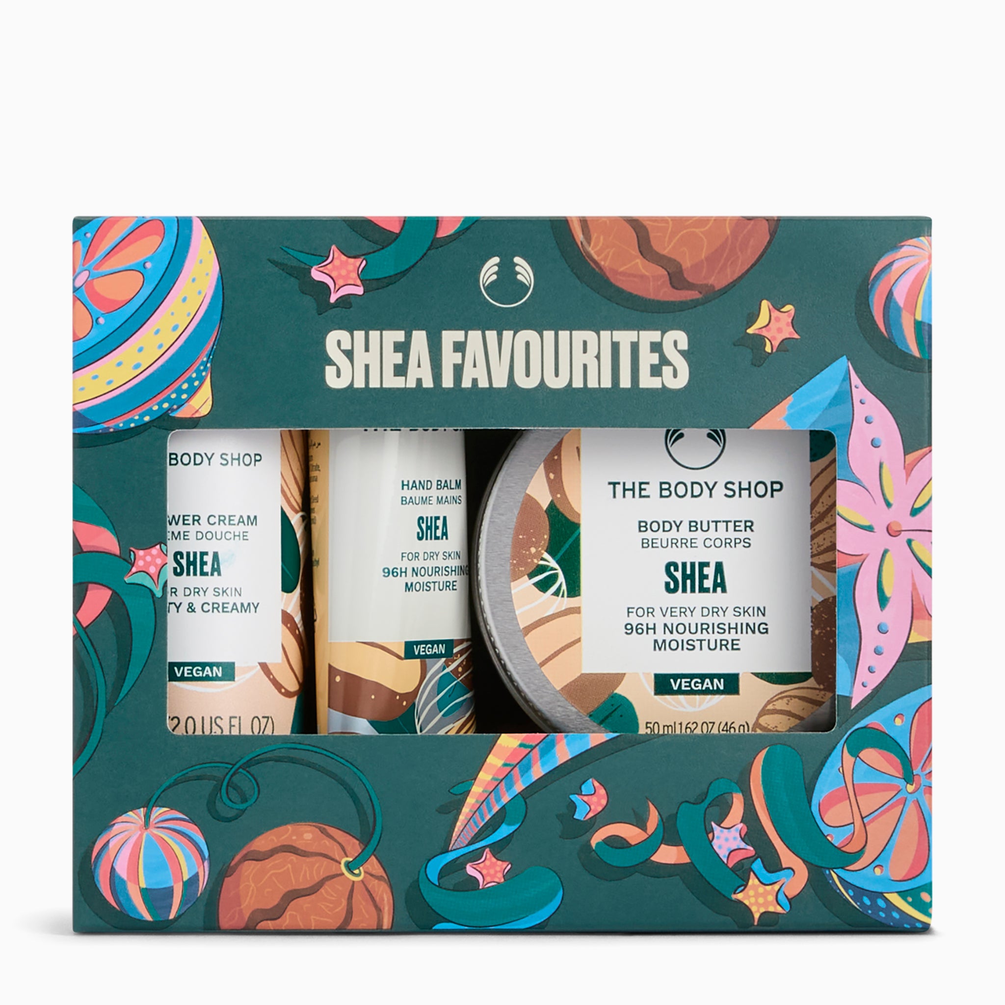 The Body Shop Shea Favourites gift set in a decorative teal box with colorful illustrated motifs, containing three Shea products: body cream, hand balms, and body butter.