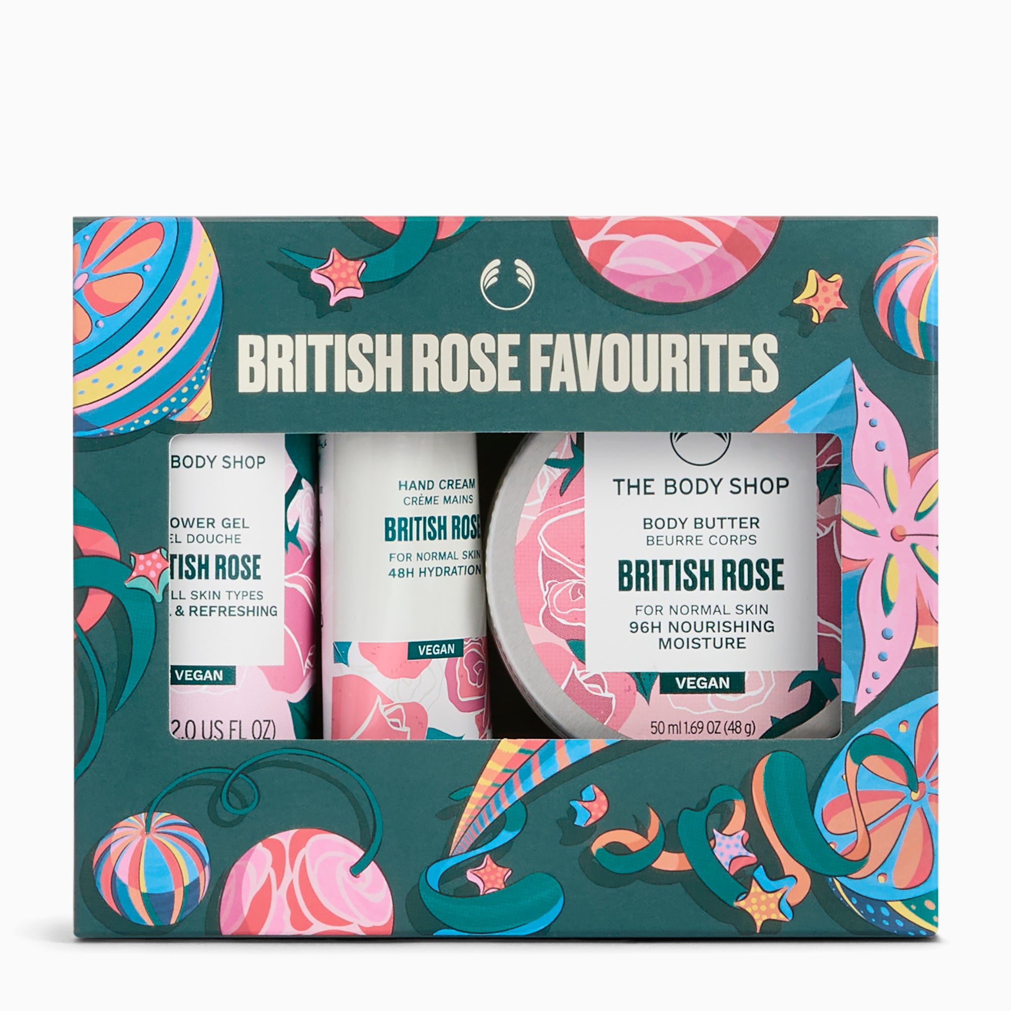The Body Shop British Rose Favourites gift set in a decorative teal box with pink, blue, and yellow illustrations. The set includes a body wash, hand cream, and body butter, all labeled British Rose.