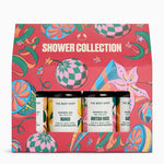 The Body Shop Shower Collection gift set in a bright pink patterned box, containing three small shower gel bottles labeled Mango, British Rose, and Satin.