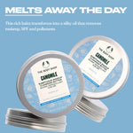 Two containers of The Body Shop Camomile cleansing balm on a blue background with text about its benefits.