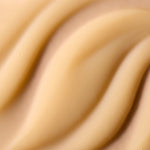 A close-up texture shot of a smooth, creamy Pumpkin shower gel, the body shop. 