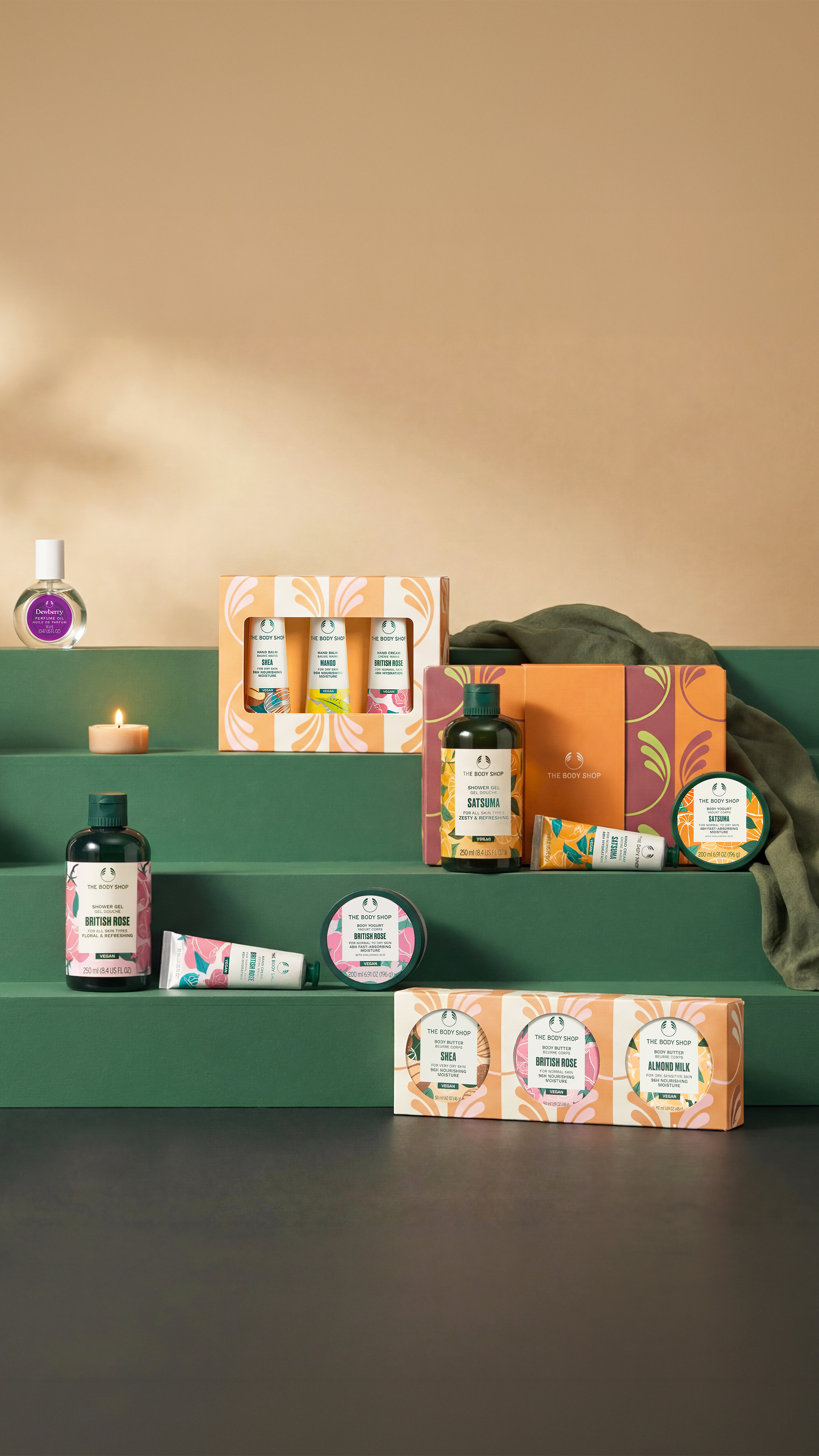 Cosmetic products on a green shelf against a beige wall